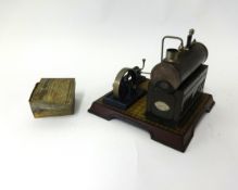 A German tin plate steam stationary engine by Gamage, London, boxed.