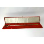 A mid 20th Century Turkish ceremonial sword and scabbard in red velvet case.