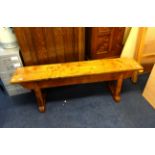 A early 20th Century wood bench.