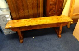 A early 20th Century wood bench.