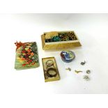 A quantity of assorted costume jewellery including watches, some porcelain and objects.