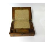 A Victorian walnut and parquetry inlaid writing slope.