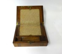 A Victorian walnut and parquetry inlaid writing slope.