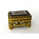 A 19th Century micro mosaic box with enamel decoration, bun feet, length approx 7cm, height 4cm.