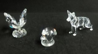 Swarovski, a miscellaneous collection consisting of Wolf, Butterfly and Toadstool.