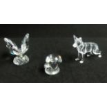 Swarovski, a miscellaneous collection consisting of Wolf, Butterfly and Toadstool.