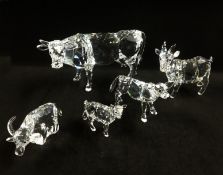 Swarovski, a collection consisting of two Cows, Goat, Sheep and a Buffalo.