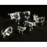 Swarovski, a collection consisting of two Cows, Goat, Sheep and a Buffalo.