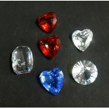 Swarovski, a collection of various coloured hearts and one clear paper weight.