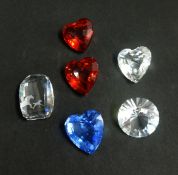 Swarovski, a collection of various coloured hearts and one clear paper weight.