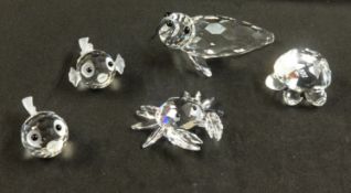 Swarovski, a collection of Sea Creatures including Crab, Seal, Turtle and two small fish, unboxed.