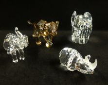 Swarovski, a collection of three Elephants and one Rhino.