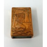 A Newlyn copper matchbox holder embossed with lighthouse and sailing boats, the reverse impressed '