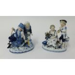A pair of continental porcelain figure groups of children, under glaze mark JR, height 16cm.