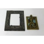 A Oriental copper photo frame with dragon decoration, 17cm x 13cm together with a brass and