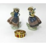 A pair of Lladro figures of girls with baskets, height 18cm together with a Royal Crown Derby box