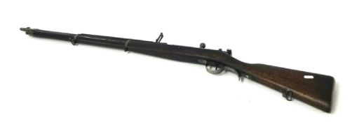 A Steyr 1886 pattern rifle, bolt action, impressed marks 'M1886, E.W.F.G.Steyr', length 132cm.