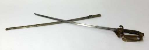 A Naval Ceremonial Officers dress sword (length 83cm), with metal scabbard.