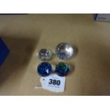 Swarovski, four small paperweights, unboxed.