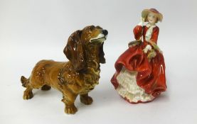 Karl Ens, model of a Dachshund, length 27cm also a Doulton figure 'Top of The Hill' (2).