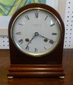 Comitti, eight day mahogany cased striking clock with key, height 21cm