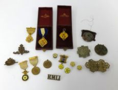 A collection of various military badges and buttons also cased medallions and a Victorian