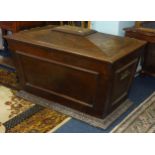 A large 19th Century mahogany wine cooler (lacking interior), of sarcophagus shape