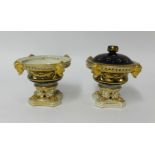 19th Century Derby porcelain, a pair of squat vases one with cover, decorated with gilt work with