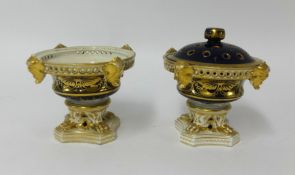 19th Century Derby porcelain, a pair of squat vases one with cover, decorated with gilt work with