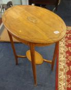 An Edwardian satinwood oval inlaid occasional table.