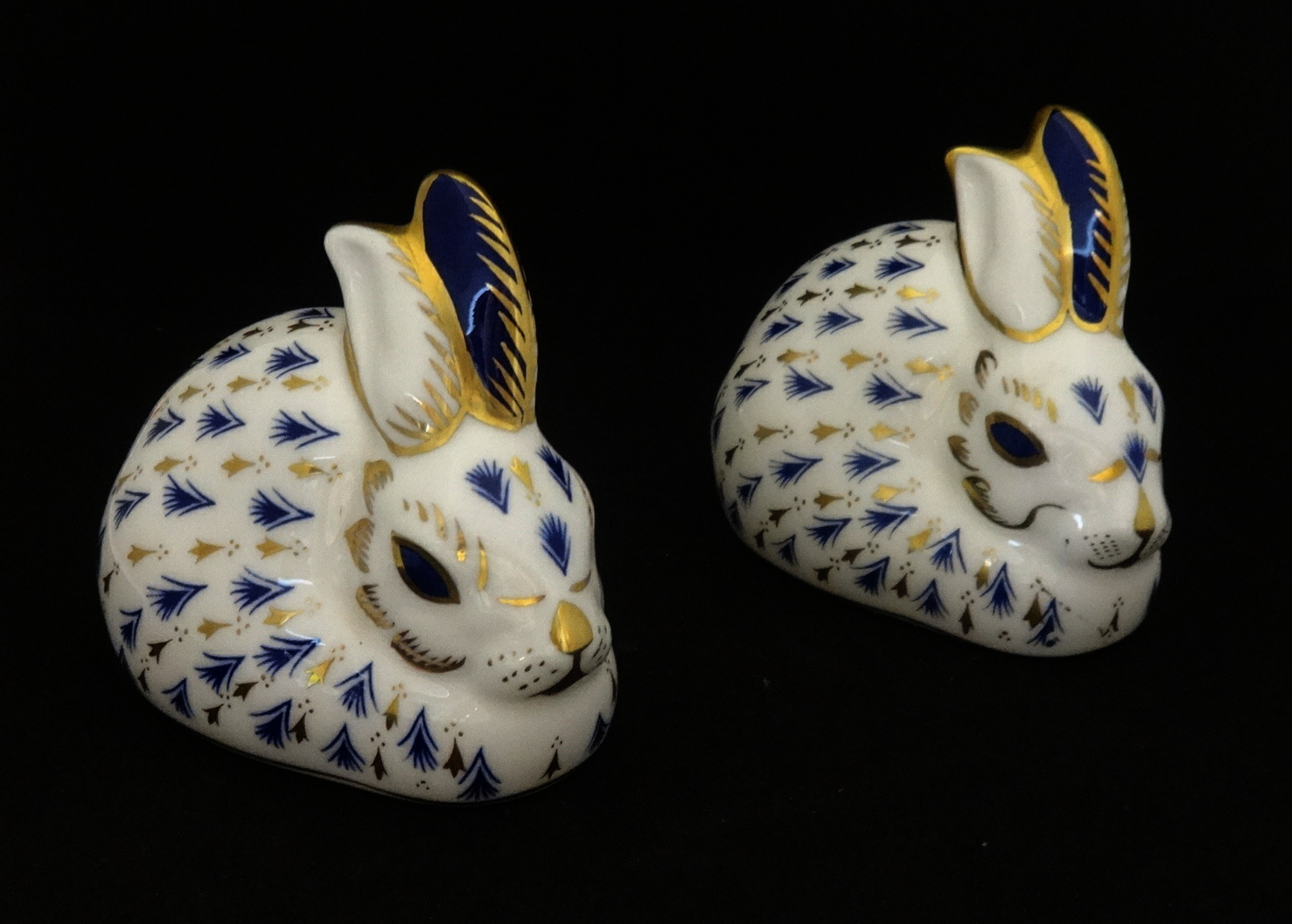 Two Royal Crown Derby paperweights, rabbits (2).