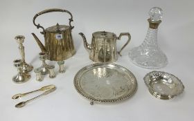 Silver plated tea pots, candlesticks and flat bottom glass decanter with silver collar.