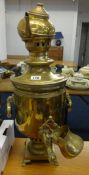 A Middle Eastern brass tea urn/samovar, height 57cm.