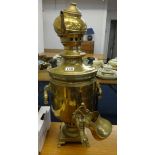 A Middle Eastern brass tea urn/samovar, height 57cm.