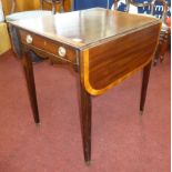 A reproduction Pembroke table of Georgian design, with wide cross banding and square tapered legs,