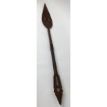 An African carved wood sphere, length 150cm also a spiral twist carving and a walking stick (3).