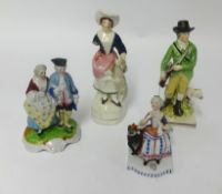 A 19th Century Staffordshire figure 'Huntsman', also three other figures (4).