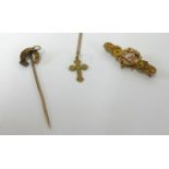 A Victorian 9ct gold brooch and a 15ct horse shoe tie pin.