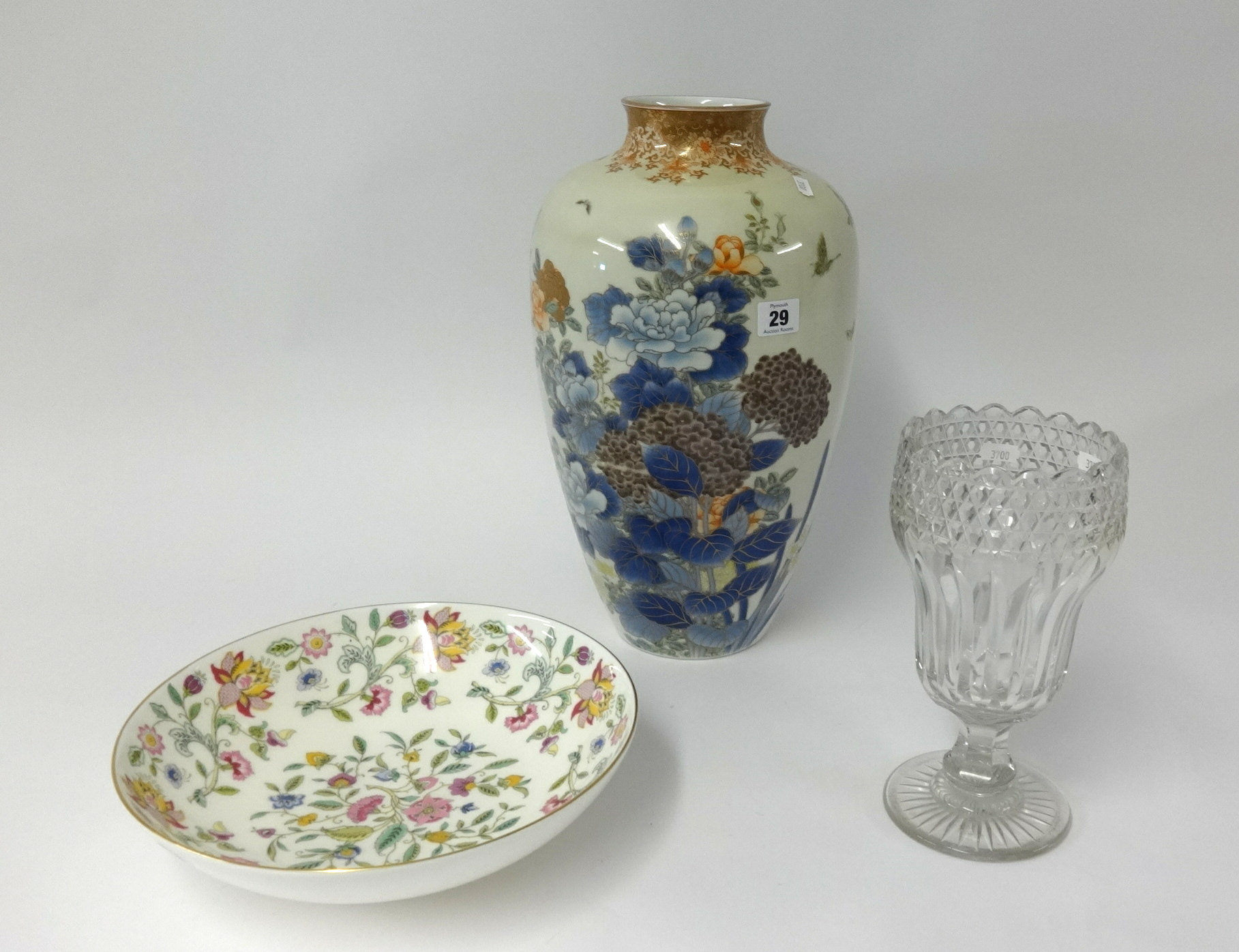 A large porcelain vase decorated with bright flowers, height 41cm also a cut glass vase, height 24cm