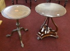 A mahogany circular occasional table and a mahogany and inlaid reproduction tripod table on claw and