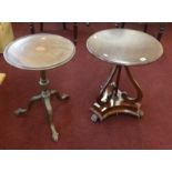 A mahogany circular occasional table and a mahogany and inlaid reproduction tripod table on claw and