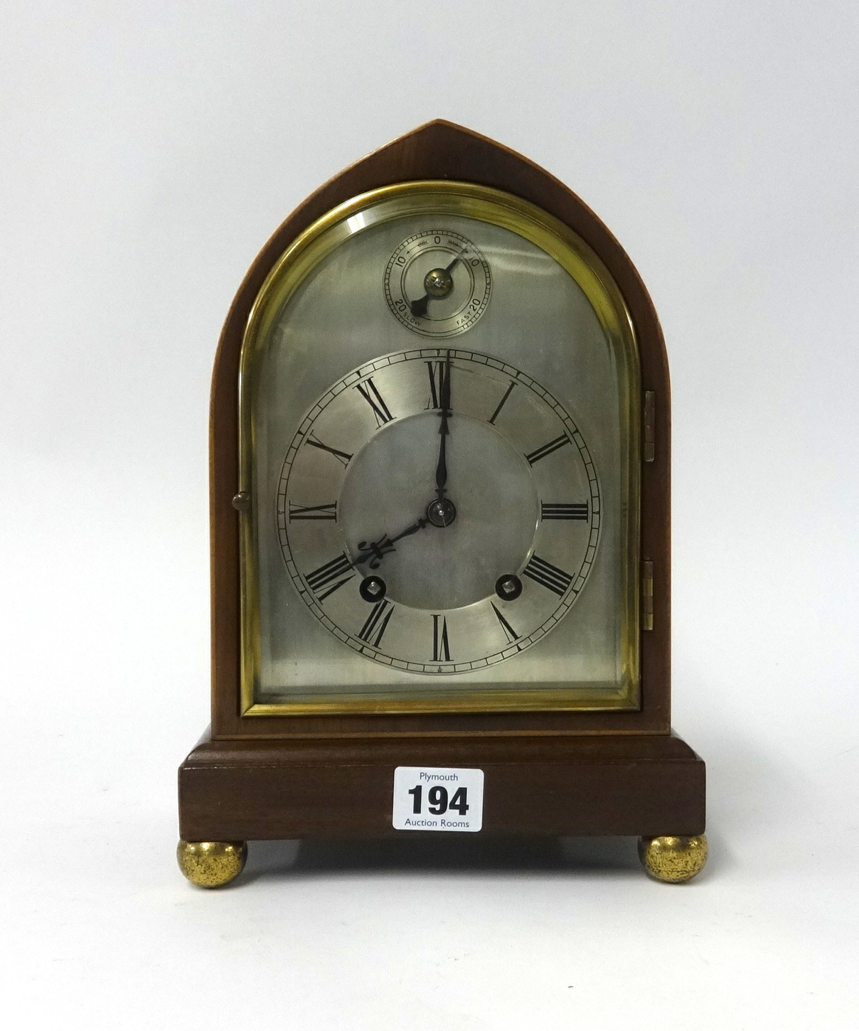 A mahogany cased bracket clock with double gong strike and eight day movement, height 27cm.