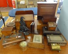 A collection of various boxes, pen and ink stand, trench art, book ends, punch door stop, tea caddy,