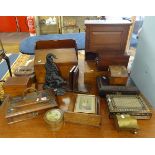 A collection of various boxes, pen and ink stand, trench art, book ends, punch door stop, tea caddy,