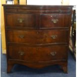 A reproduction mahogany serpentine bachelors chest fitted with four drawers, width 70cm.