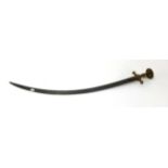 A Middle Eastern sword with curved blade and gilt decorated pommel, overall length approx 95cm.