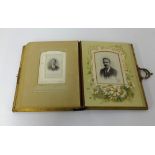 An Edwardian photograph album inscribed 'Christmas 1900' with some family portraits.
