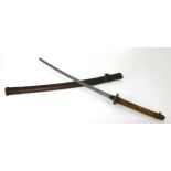 A Japanese short samurai sword (length 92cm), with leather scabbard.