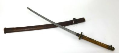 A Japanese short samurai sword (length 92cm), with leather scabbard.