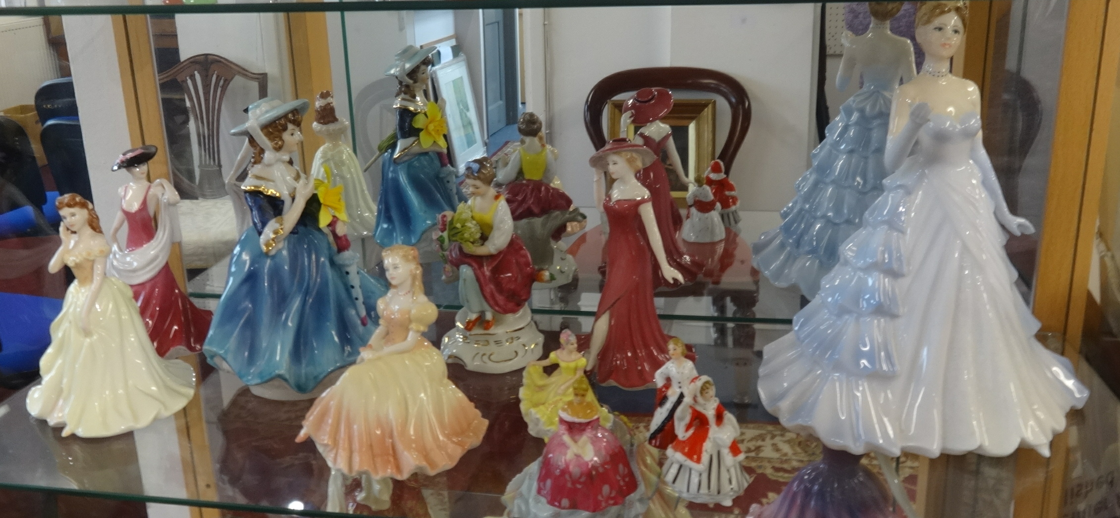 A collection of 19 porcelain figurines including Coalport, Doulton Pretty Ladies series and - Image 2 of 3